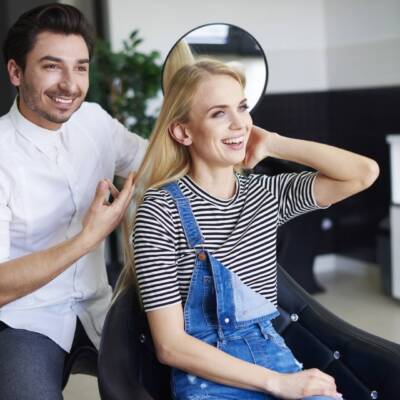 Happy woman at the hairdresser